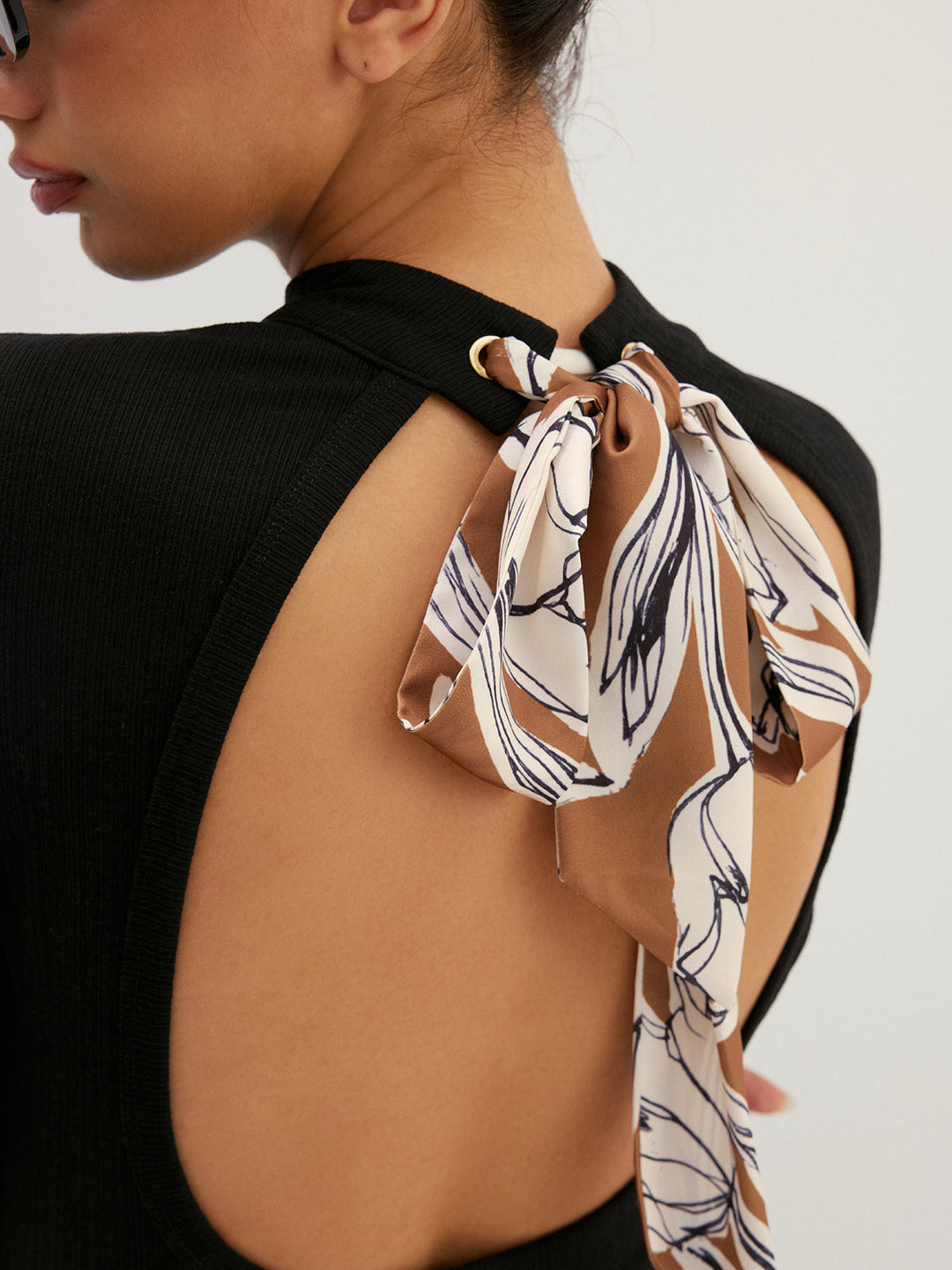 Back Cutout Printed Bow High Neck Top